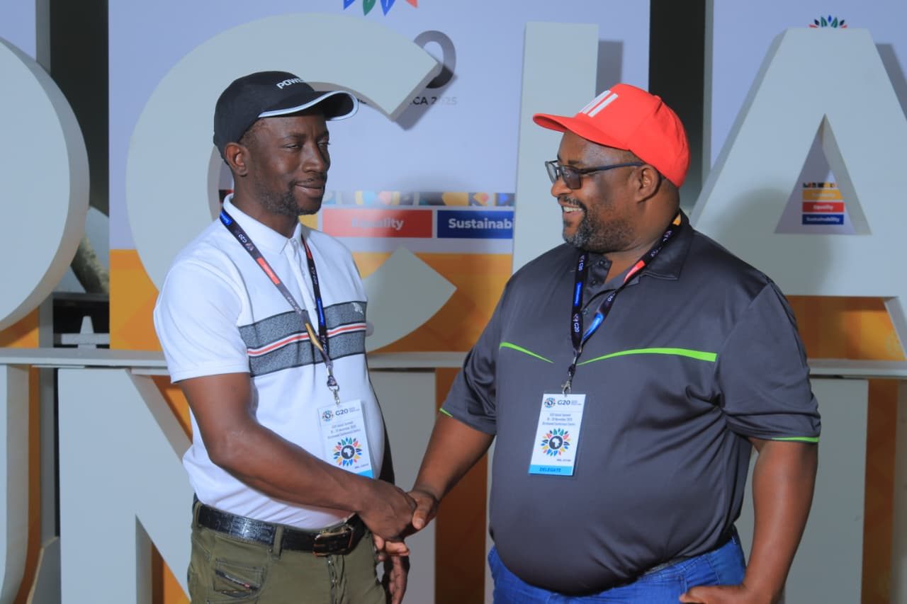 NUFBWSAW leadership handshake at a sector event